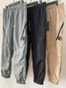 Mens Sweatpants Designer Cargo Calças Para Homens Calças De Cintura Elástica Primavera E Outono Maré Esportes Lazer Nylon Calça De Secagem Rápida À Prova D 'Água Solta Calças Masculinas