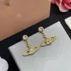 Boucles d'oreilles de goujon de lamelle Viviane Femmes de luxe Bijoux de mode Saturne Earl Gold Oreau d'oreille Cjeweler Planet Westwood Femme Z3KQ