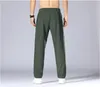 2024 Yoga LL Pantaloni lunghi da jogging da uomo Sport Yoga Outfit Outdoor City-Sweat Yogo Gym Tasche LL Pantaloni sportivi Pantaloni Uomo Casual Elastico in vita fitness LU