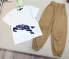 Nouveaux vêtements de marque pour enfants Survêtements pour bébés à manches courtes Taille 100-160 Logo imprimé T-shirt à col rond et pantalon à taille élastique Dec20