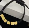 Moda Europa e America Cubo Dadi Lettera Bracciale con ciondoli Corda nera Catena Designer Marchio Bracciale estensibile Uomo Donna Regalo dell'amante di alta qualità