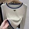 Designer tröja kvinnors stickkläder mode pullover crewneck långärmad lapptäcke färg kontrast klistermärke lapel fast färg högkvalitativ topp vårhöstvinter vinter