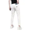 Pantaloni da donna Capris firmati Xintang Nuovo prodotto Jeans bianchi per prodotti europei da uomo Primavera/Estate Slim Fit Piedi piccoli Elastico Casual Crop Trend VD0E