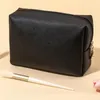 Kosmetiktaschen PU-Ledertasche für Frauen Minimalismus Make-up Täglicher Gebrauch Tragbare Aufbewahrungstasche Kleine ordentliche Tasche