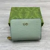 23 mulheres carteiras curtas Luxurys designers bolsa de bolsa de bolsa de viagem Galeira Zippy Coin Burse com caixa verde 11cm