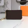 Äkta läder nyckel plånböcker pochette designer nyckelring mode kvinnor män kreditkort hållare mynt handväska lyx plånbok väska charm bro218m