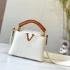 Bolso clásico de moda Mini bolso Capucines Mujer Cuero de vaca granulado Funda con tapa Bolsos Bandolera para mujer Embrague VINTAGE Bolso de mano pequeño Bolsos de mensajero