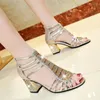 Sandaler Kvinnors Peep Toe Strappy Gladiator Gold Silver High Heels Woman Shining Crystal Wedding Shoes Summer Boots Kvinnor