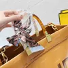 Tote boodschappentas met grote capaciteit Sunshine Bags Vintage schouderhandtas Portemonnees Dames Leer Gouden briefhoofd Portretdecoratie