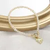 Bracelets de charme Pendentif d'amour français Perle d'eau douce naturelle Femme Simple Lumière Luxe Bijoux de mode