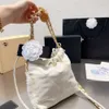 Designer Tasche Mini Perle Müllbeutel Kette Umhängetasche Mini kleine Tasche Chanelia Berg Kamelie Einkaufstasche weiblich