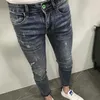 Pantaloni Ricami Baffi di gatto Graffi Piedi piccoli Adolescenti Jeans slim Uomo Estate Nuovi pantaloni a matita per persone sociali alla moda coreane sottili