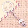 Keychains 20pcs Fashion Keychain 23x12mm Skeleton Skull Pendants DIY Men Jewelry Car Key Chain Ring Holder Souvenir For Gift