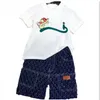 Roupas de roupas infantis de novo designer Conjunto de roupas de verão Meninos e meninas Baby Baby Rouve de manga curta para crianças tamanho 90cm-150cm B14