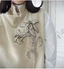 女性用トレンチコートハイエンドチャイニーズスタイルの手作りビーズシルクのゴールデンベルベットベスト女性薄い綿のノースリーブジャケット秋の冬
