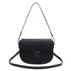 60% OFF Designer bag Spring New Women's Fashionable Versatile Saddle French Small Stand One Shoulder Solid Color Simple Crossbody Bag