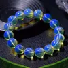Strand Blue Amber Armband Män Kvinnor Läkar ädelsten Fina smycken Baltiska bärnstenspärlor Elastiska armband