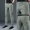 Männer Hosen Herbst Winter Elastizität Casual Einfarbig Hohe Taille Bleistift Übergroße Kleidung Alle-spiel Tasten Zipper Schlank gerade