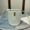 Design luxuoso e moderno, feito de material de couro, bolsa balde clássica feminina, pequena e delicada, alça de ombro removível, bolsa retrô e versátil