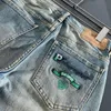 Jeans viola Jeans da uomo Jeans firmati Pantaloni da uomo Design con scritte verdi Pantaloni sportivi slim casual per l'industria pesante Pantaloni da jogging