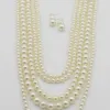 Nya modetillbehör Kvinnor Långa pärlor halsband med diamant inlagd pärlblomma halsband pärlor örhängen lång tröja kedja