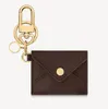 Designers Luxurys Wallet Keychain Keyring Fashion Purse Pendant Car Chain Charm Brown Old Flower M68863 Mini Bag Trinket Gifts Acc8078958