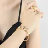 Brazalete de acero inoxidable para mujer, chapado en oro con incrustaciones de diamantes de imitación, joyería de lujo encantadora a la moda, regalos para parejas