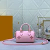 Sacs de soirée Conception de niche Mini cylindre d'épaule de haute qualité Oreiller messager Sacs de luxe 2024 FashionBags Sac à bandoulière de haute qualité Sac à bandoulière rose