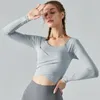 Actieve shirts Mode herfst- en winteryogajurk met borstkussen Slanke kruisvouw Sport-fitnesskleding met lange mouwen Dames