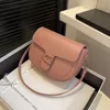 60% OFF Designer bag Spring New Women's Fashionable Versatile Saddle French Small Stand One Shoulder Solid Color Simple Crossbody Bag