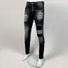 Мужские джинсы Уличная мода Мужчины Ретро Черный Серый Стрейч Slim Fit Рваные кожаные заплатки Дизайнерские хип-хоп Брендовые брюки Hombre