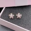 Stud Earrings Copper Inlaid Zircon Hollow Five-petal Flower Female Fashion Simple Korean Version Of High-grade Beautiful