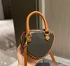 Hombro Bolsos de diseñador Amor Bolso de cuero Moda para mujer