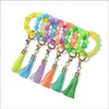 Llavero de muñeca Pulsera de cuentas de silicona Fluorescente Borla Llavero Resplandor en la oscuridad Colgante Pulsera Llavero Pulsera Brazaletes Titular