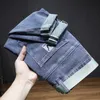 メンズジーンズデザイナー2021新しいファッションブランドルーズ汎用スリムフィットパンツ韓国の刺繍マイクロハルンクロップドパンツ30lb