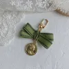 Designer keychain Luxury key chain bag charm female car key ring Pearl charm green ribbon delicate shells keychain couple pendant gift nice good