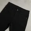 Jeans da uomo firmati Slim Feet Fit Primavera / Estate Stretch confortevole per 2023 Pure Black Station Fashion Brand Pantaloni 6A13