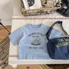 Set di abbigliamento 5414B T-shirt per bambini 2023 Summer Simple Fashion Girl T-shirt a maniche corte con stampa a lettere 1 7 anni Top casual da ragazzo 230630