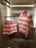 Calças femininas de duas peças com listras metálicas contraste de cor camiseta feminina de manga curta + shorts soltos conjunto casual e versátil de roupas para casa QCDC