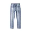 メンズジーンズデザイナー春/夏韓国版刺繍穴のある小さな足のスリムフィット高品質のロングパンツDL68