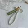 Designer keychain Luxury key chain bag charm female car key ring Pearl charm green ribbon delicate shells keychain couple pendant gift nice good