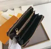 豪華なバッグデザイナージッピーロックメウォレットカウハイドロングウォレット大きなレターエンボス加工されたジッパークラッチバッグコイン財布ジッパーポケット大容量女性財布