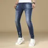 Jeans pour hommes Designer Designer Printemps Nouveau Badge Marque de mode européenne Pantalon slim Pantalon élastique WGBG 0OAI
