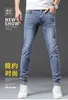 Diseñador de jeans para hombres 2023 Primavera Nuevo Slim Fit Algodón Marca de moda Jóvenes coreanos Impreso Pantalones bordados ASI