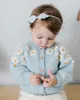 Dopasowanie rodzinnych stroje marki dla dzieci kurtki kurtki zimowe haft ręczny urocza córeczka Knit Cardigan Emewear Piękna europejska tkanina dla dzieci 230630