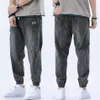 Jeans män 2020 Nya lösa harembyxor tvättade denim fyra säsong utomhus manliga streetwear mode komfortbyxor jeans para hombre x278k