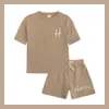 Ensembles de vêtements 2023 personnalisés garçons filles été solide coton imprimé vêtements pour bébés personnalisés courts TshirtShorts costumes pour enfants 230630