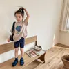 Overall 2023 barn bomullshorts flickor vintage blomma tryck barn baby casual byxor lösa spädbarn sommar andningskläder 230630