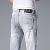 Jeans pour hommes designer printemps/été édition coréenne petit pied élastique Slim Fit marque européenne gris blanc pantalons longs J2H8