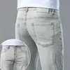 Jeans masculino designer de Hong Kong moderno jeans high-end verão fino cinza branco versátil casual elástico fino ajuste pequeno calças retas 7HCP